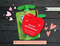 an advertisement with a red apple on it and hearts coming out of the back side