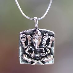 From Komang Wijayana this intriguing silver necklace features an intricately detailed pendant on a sterling chain. It reverently depicts Ganesha the Hindu lord with the head of an elephant in meditation. .925 Sterling silver Hindu Jewelry, Bracelet Stands, Ganesha Pendant, The Hindu, An Elephant, Sterling Silver Cuff Bracelet, Pearl Earrings Dangle, Sterling Silver Necklace Pendants, Sterling Silver Cuff