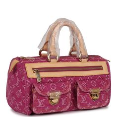 This Vintage Neo Speedy is in Pink Monogram Denim with gold hardware, contrast stitching, vachetta handles, trimming on front and back, two rounded top handles, internal slip pocket, internal logo patch, front zip-fastening pocket, and two front flap pockets.The interior is lined in pink microfiber.Origin: FranceCondition: Vintage; Never - some slight storage wear is present. Accompanied by: Louis Vuitton dustbagMeasurements: 12" width x 6.5" height x 6" depth; 3" handle drop Y2k Closet, Vintage Louis Vuitton Handbags, Dream Bags, Pink Monogram, Pink Denim, Vintage Purse, Vintage Louis Vuitton, Denim Bag, 3d Projects