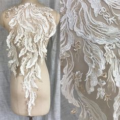 a mannequin with white lace on it