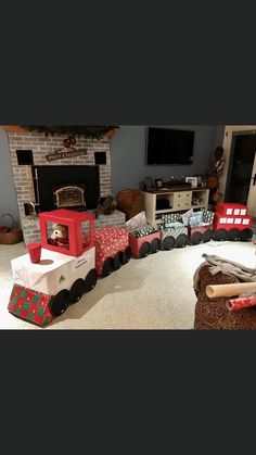 a toy train is sitting in the middle of a living room