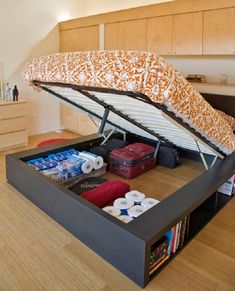 a bed with a storage compartment underneath it