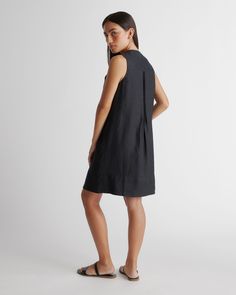 Sleeveless style with a little swing. This spring summer staple can do it all. Featuring pin-tucking up top, shell buttons, and pleat detailing. Our linen collection is made from 100% European flax linen—an eco-friendly, and resource light material.  | Quince | Women's 100% European Linen Sleeveless Swing Dress in Black, Size XL Pleated A-line Sleeveless Dress For Daywear, Spring Sleeveless Workwear Dress With Pleated Back, Spring Workwear Sleeveless Dress With Pleated Back, Summer A-line Sleeveless Dress With Pleated Waist, A-line Sleeveless Dress With Pleated Hem For Spring, A-line Pleated Sleeveless Dress For Daywear, Black Summer Dress With Pleated Back, Chic Sleeveless Summer Dress With Pleated Back, Sleeveless Summer Dress With Pleated Back