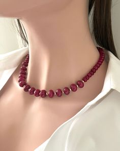 Gorgeous Chunky Red Jade Necklace in 14K Goldfilled .Matching Earrings included . The Deep red definitely makes it a a style statement !  Very Similar to a Faceted Ruby necklace ! Graduated Red Jade Beads : Goldfilled Lobster Clasp Red Jade Beads : 8 - 12 mm Necklace length : 18 inches + 1.00 inches Jade has long been considered to be a lucky stone, especially by the peoples of Southeast Asia. The spiritual meaning of Jade is longevity and wisdom. It is believed to facilitate access to the spiritual realms, provide protection against negative energies and entities, and also to enhance our creativity and imagination Red Hypoallergenic Jewelry For Party, Hypoallergenic Red Jewelry For Parties, Red Hypoallergenic Party Jewelry, Hypoallergenic Red Round Jewelry, Red Necklace For Christmas Anniversary, Red Single Strand Jewelry For Party, Art Nouveau Pendant, Red Jade, Lucky Stone