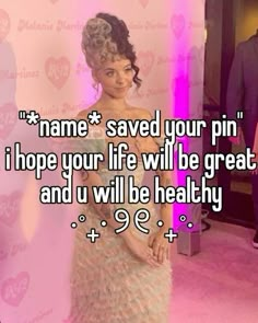 a woman standing in front of a pink wall with the words name saved your pin i hope