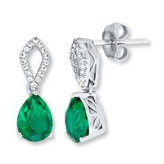 Breathtaking pear-shaped, lab-created emeralds dangle from kite-shaped frames in these exceptional earrings for her, crafted of sterling silver. Twinkling lab-created white sapphires complete the look. The earrings secure with friction backs. Teardrop May Birthstone Earrings, Elegant Teardrop Earrings For May Birthstone, Formal Green Sterling Silver Teardrop Earrings, Green Sterling Silver Teardrop Earrings For Formal Occasions, Formal Green Teardrop Sterling Silver Earrings, Elegant Pear-shaped May Birthstone Earrings, Lab Created Emerald, Kay Jewelers, Emerald Earrings