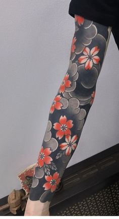 a person with a tattoo on their arm