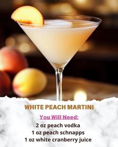 a white peach martini is served in a coupe glass