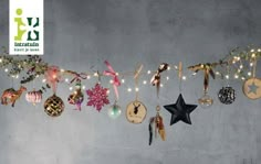 an assortment of christmas ornaments hanging on a wall