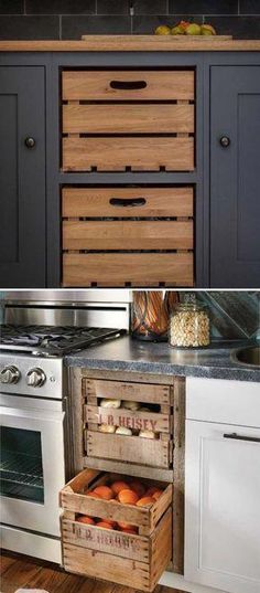 some crates are stacked on top of each other in front of an oven and microwave