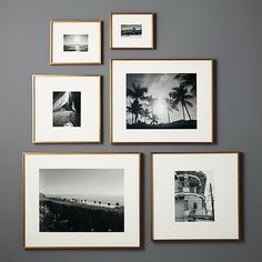 black and white photographs hanging on the wall