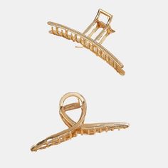 Elevate your hairstyle with this chic gold-tone claw hair clip set. Crafted with a sleek metallic finish, these hair clips add a touch of sophistication to any look. The claw design provides a secure hold, keeping your tresses in place effortlessly. Whether you're styling an updo, half-up, or ponytail, these versatile clips offer a polished and modern accessory for your hair. Lightweight and durable, they are perfect for everyday wear or special occasions. Product Code:CAC02A4D001NN Trendy Hair Accessories, Claw Design, Claw Hair Clip, Claw Hair Clips, Modern Accessories, The Claw, Your Hairstyle, Trendy Hair, Scarf Hat