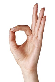 a person's hand making the v sign with their fingers