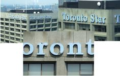 the toronto star sign is on top of an office building