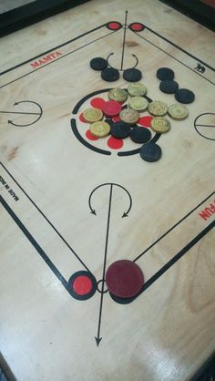 an air hockey table with buttons on it