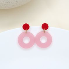 Lasered circle earrings made of acrylic. The earrings are lovingly handmade in our studio. We used shiny and semi-gloss acrylic and well tolerated stainless steel stud earrings. Dimensions: 3 cm long x 2.2 cm wide. The earrings are particularly light. Trendy Red Circular Jewelry, Trendy Red Resin Earrings, Minimalist Red Round Earrings, Modern Red Round Earrings, Pink Circle Earrings As A Gift, Pink Circle Earrings For Gift, Pink Circle Earrings For Gifts, Circle Stud Earrings, Circle Earrings Studs