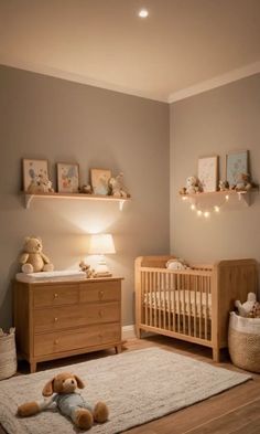 a baby's room with two cribs and a teddy bear on the floor