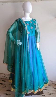 Peacock blue green anarkali with hand embroidery Anarkali Choli In Turquoise For Festivals, Green Art Silk Churidar For Party, Anarkali Turquoise Choli For Festivals, Green Raw Silk Churidar With Dori Work, Blue Anarkali Chanderi Gown, Green Raw Silk Anarkali Set With Dori Work, Turquoise Anarkali Salwar Kameez For Festivals, Anarkali Turquoise Choli With Dupatta, Bollywood Style Turquoise Anarkali Set With Resham Embroidery