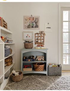 a child's room with toys and bookshelves on the wall, carpeted floor