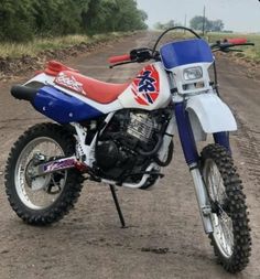 a dirt bike parked on the side of a road