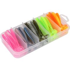 a plastic container filled with lots of different types of fishing lures