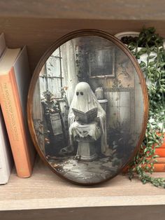 a ghost sitting in a chair on top of a book shelf next to some books