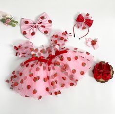 Welcome to Wowallets Dress and Accessories!  We bring the girls good quality dresses and handmade accessories. Each product is made very carefully with all the heart of a mother. Wish you a happy shopping !   Your little is ready for her close up in this beautiful Strawberry Dresses. She is sure to love feeling like a princess. So beautiful and elegant, the Strawberry Dresses is a must have style to add to your little girl's wardrobe. It is the perfect birthday party dress or something that will Strawberry Dresses, Baby Birthday Outfit, Baby First Birthday Themes, Dress And Accessories, Perfect Birthday Party, Strawberry Dress