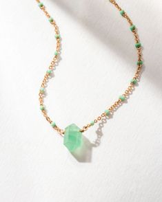 Celebrate August's alternative birthstone with our enchanting Green Aventurine collection. We offer a variety of styles to ensure you find just the right piece to love. Choose from multiple designs and discover the one that perfectly matches your taste and individuality, a piece that speaks to you or your loved one. Dainty enough for layering or vibrant enough to wear solo, this necklace captures the essence of Green Aventurine’s beauty and charm. Delicate May Birthstone Gemstone Necklace, Dainty Gemstone Charm Necklace For May Birthstone, Jade Jewelry For May Birthstone Gift, Dainty Green Gemstone Charm Necklace, Dainty May Birthstone Gemstone Necklaces, Minimalist Jade Jewelry For May Birthstone, Minimalist May Birthstone Crystal Necklace, Jade Pendant Beaded Necklace For Gifts, Jade Pendant Beaded Necklaces As Gift