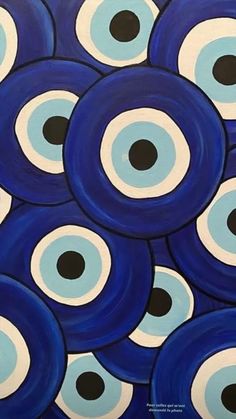 an image of blue and white circles with black dots on them, painted in acrylic paint