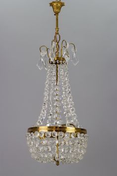 a gold chandelier hanging from the ceiling