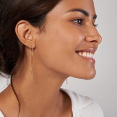 These trendy and versatile 3-inch paperclip drop earrings are the perfect everyday accessory. Masterfully crafted in non-tarnishing 14K yellow gold, these stunning earrings feature three paper clip links and a secure push-back backing. Whether they are worn to the office or a black tie event, these earrings are sure to add a touch of elegance to any outfit. If you are looking for a unique, stylish, and expertly crafted piece that will sparkle unconditionally, these are the earring for you! Golden Earrings, Solid Gold Chains, Link Earrings, Gold Paper, Stunning Earrings, Gold Earrings Dangle, Lariat Necklace, Chain Earrings, Minimalist Earrings