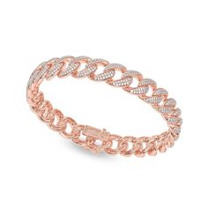 This Diamond Cuban Link Bracelet showcases a meticulously crafted curved Cuban link chain that gracefully wraps around your wrist. Each link is adorned with a radiant round diamonds, creating a continuous shimmer that catches the eye and elevates your every look. This diamond-cut bracelet stands as the epitome of a solitary style statement, exuding both strength and elegance with a distinct touch that sets it apart. Bracelet Stands, Cuban Link Bracelet, Cuban Link Chain, Cuban Link, Style Statement, Diamond Cut, Link Chain, Link Bracelets, Round Diamonds