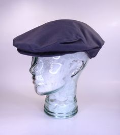 FREE SHIPPING The classic cap suitable for everyone and compliment many styles. The dark navy lightweight canvas cotton is a perfect neutral and will be excellent for your summer wardrobe. It can be washed in cold water and laid flat to dry. The brim board is made from compressed polystyrene and can be molded with your hands to create the curve to your liking. This handmade hat will be in your wardrobe for years to come. This hat is a size 7 or 56 cm The proper fit should be snug without being tight and if you put a finger between your head and the hat while it is pulled down it makes it too tight. It's very important to measure your head correctly.  There are a few things that you need. Please visit our website www.littlehatshop.com , Measuring Heads Page for more information. *A flexible Navy Cotton Brimmed Hat, Navy Brimmed Hat For Outdoor, Navy Cotton Baseball Cap For Outdoor, Gray Cotton Hat With Short Brim, Gray Brimmed Cotton Hat, Navy Cotton Six-panel Hat, Navy Adjustable Cotton Fitted Hat, Adjustable Navy Cotton Fitted Hat, Navy Cotton Hat With Short Brim