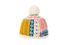 a multicolored knitted hat with pom - pom