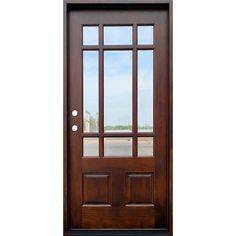 a wooden door with glass on the side