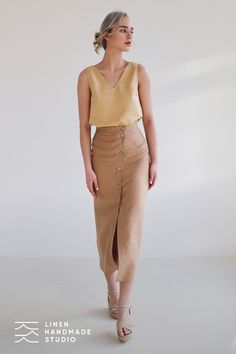 Straigh cut linen skirt Cybile in Camel. Features: • asymmetrical fitted silhouette • open front slit skirt • skirt length is 37.40 inches (95 cm) • handmade at a small studio in Europe Linen Skirts, Sewing Online, Calf Length Skirts, Travel Wardrobe, Skirt Skirt, Linen Skirt, Fitted Silhouette