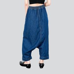 Step back in time with the 2023 Autumn Collection's 90's-trend unrubbed harem denim pants! With its baggy fit. high-waist cut. and rubber closure. these pants provide ultimate comfort while making a fashion statement that can't be ignored. Featuring a medium wash. these pants are the perfect balance of modern day style and yesteryear's charm.Distinctive Features: 90s Style: Experience the nostalgia of the 90s with these timeless harem pants! Medium Wash: Find the perfect balance between modern-d Indigo Baggy Wide Leg Bottoms, Indigo Baggy Bottoms For Spring, Indigo Baggy Casual Jeans, Baggy Indigo Casual Jeans, Baggy Cropped Jeans In Denim Blue With Pockets, Spring Baggy Dark Wash Cropped Jeans, Baggy Denim Blue Pants, Baggy Denim Blue Cropped Jeans, Baggy Denim Blue Jeans