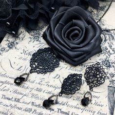 A Gothic Victorian elegant design of a black rose with a gothic ornament pendant and fitting earrings, made to bloom with your goth dress, special event or a casual gothic outfit. Goth fashion is distinguished by darkness, mystery, elegant wardrobe pieces and, smoky makeup even though it may surprise some that not all Goths always wear black. It's said that all Goths have the desire to stand out in a society considered too conformist. - Handmade jewelry - Black Czech high quality teardrop  beads Black Steampunk Jewelry For Halloween, Steampunk Black Jewelry For Halloween, Steampunk Black Halloween Jewelry, Halloween Black Steampunk Jewelry, Victorian Black Earrings For Party, Black Steampunk Jewelry For Party, Gothic Black Jewelry For Evening, Black Gothic Jewelry For Evening, Gothic Style Black Jewelry For Evening