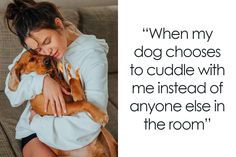 a woman is hugging her dog while sitting on a couch with the caption, when my dog chooses to cuddle with me instead of anyone else in the room