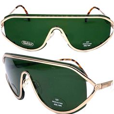 Safilo Emozioni 349/S occhiali da sole a fascia/scudo Fatto a mano in Italia negli anni '80. Design modernista e alla moda in metallo dorato con lenti a scudo tutto in uno e sulla parte superiore struttura in metallo con aste abbinate. Nuovo e mai indossato da deadstock in ottime condizioni Misure Aste 13,5 cm Ponte 1,5 cm totale 14,5cm Retro Shield Sunglasses With Anti-reflective Coating, Vintage Aviator Shield Sunglasses With Uva Protection, Retro Aviator Shield Sunglasses With Anti-reflective Coating, Retro Shield Sunglasses With Gradient Cat Eye Lenses, Retro Cat Eye Shield Sunglasses With Gradient Lenses, Retro Aviator Shield Sunglasses With Tinted Lenses, Retro Shield Sunglasses With Uva Protection, Retro Gold Shield Sunglasses With Gradient Lenses, Retro Cat Eye Shield Sunglasses With Uv Protection