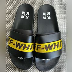 New Men's "Off-White" Industrial Belt Slides, Black/Yellow, Signature Off-White Dust Bag, Off-White Box, Size: Us-9, Eu-42. Yellow Slides With Rubber Sole And Round Toe, Yellow Slides With Round Toe And Rubber Sole, Yellow Leather Sneakers For Summer, Off White Industrial Belt, Off White Belt, Sandals Luxury, White Industrial, White Flip Flops, Rubber Flip Flops