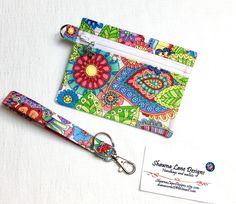 a keychain and lanyard with a business card holder