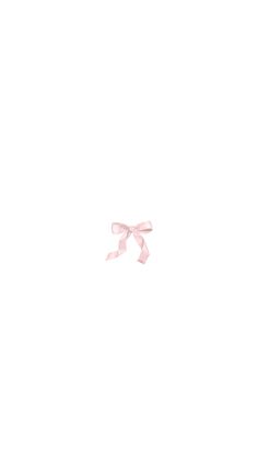 a pink ribbon tied to a white wall