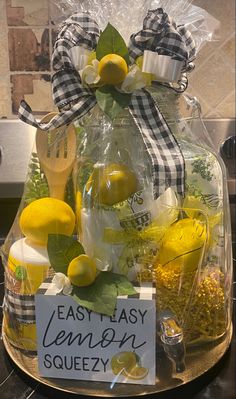 a glass jar filled with lemons and spices