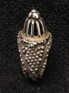 Ring ~ Vintage Tribal Yeman Size 7 1/2 Late 1800's This is an impressive and heavy Bedouin tower ring. It has decorations on all sides of the tower, a pyramid of silver drops that spill over to the sides of the single shank band. The ring face tests positive for silver but the shank has little precious metal. It is in good vintage condition and looks lovely on. Yes ~ along with basic simplicity ~ It's all about you You deserve to know about my fabulous Treasure chest HeartbeatHandmade and Big Su Bohemian Silver Drop Jewelry, Ornate Silver Rings For Jewelry Making, Silver Jewelry With Unique Design For Ceremonial Occasions, Silver Teardrop Crown Jewelry For Anniversary, Ornate Silver Rings For Ceremonial Occasions, Silver Teardrop Rings With Spiritual Style, Silver Spiritual Teardrop Ring, Spiritual Silver Teardrop Ring, Traditional Silver Drop Jewelry