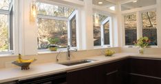 a kitchen with two sinks and three windows stock photo image 537982