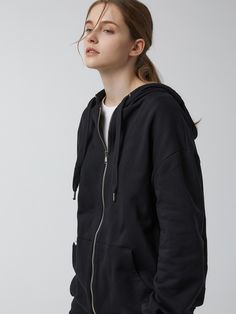 Editor's notesSoft and stretchy, this zip front hoodie features relaxed silhouette and side pockets. It has logo embroidery at back. - Soft and stretchy- Relaxed fit- Hooded design- Zip fastenings through front- Embroidery detail at backMeasurements(in.)Size One Size(XS-M)- Shoulder: 23.23 in - Bust: 24.41 in - Sleeve: 22.83 in - Hem: 18.31 in - Armhole: 9.06 in - Length: 28.94 in Composition & Care- 100% Cotton - Dry Cleaning or Machine Wash Desi Cotton Hoodie With Side Pockets, Sporty Hoodie With Zipper And Relaxed Fit, Sporty Hoodie With Zipper Closure And Relaxed Fit, Sporty Hoodie With Zipper Closure In Relaxed Fit, Sporty Solid Color Hoodie With Zipper Closure, Half-zip Cotton Hoodie With Pockets, Casual Half-zip Activewear With Drawstring Hood, Sporty Half-zip Outerwear With Drawstring Hood, Half-zip Hoodie With Zipper Closure