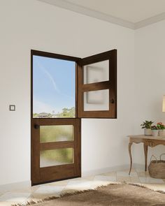 an open door in a white room with a table and vase on the floor next to it