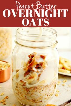 a glass jar filled with overnight oats on top of a table next to other food