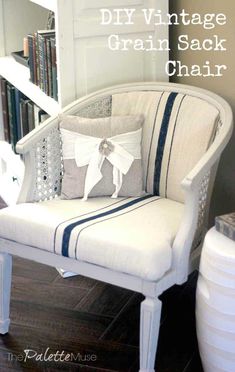 a chair with a pillow on it and the words diy vintage grain sack chair